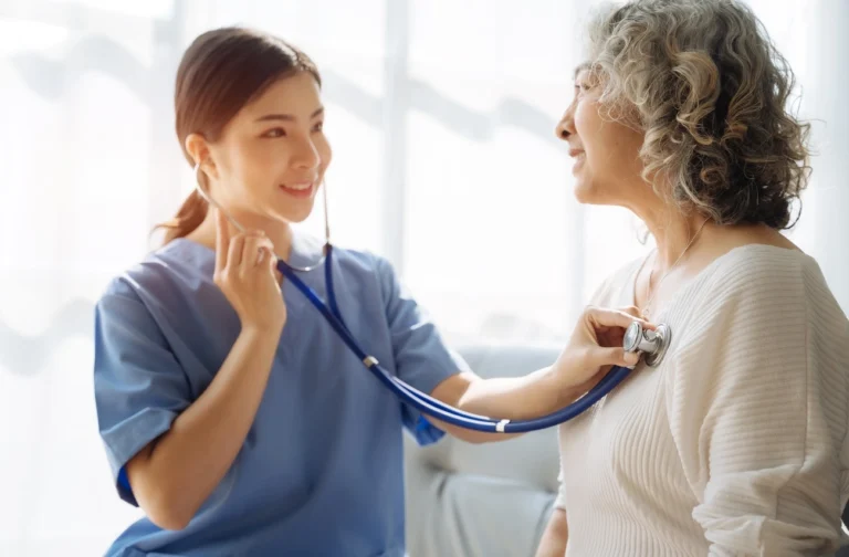 CMA checking lung sounds of patient