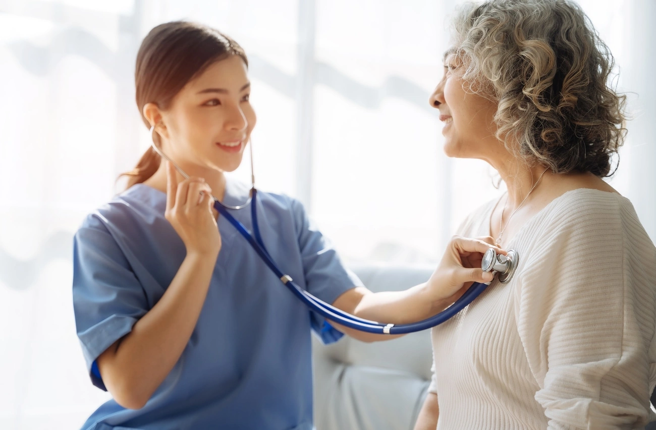 CMA checking lung sounds of patient